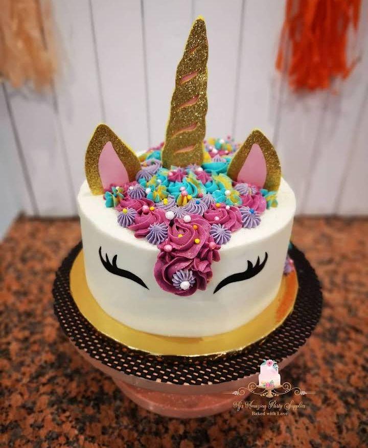 Custom unicorn cake by AJ's